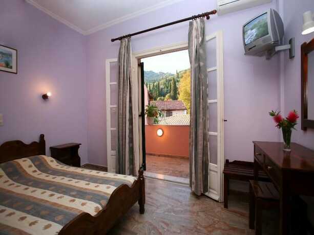 Imagen de la habitación del Hotel Alexis Apartments Benitses. Foto 17