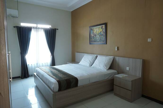 Imagen de la habitación del Hotel Aleyra and Villa Garut. Foto 18