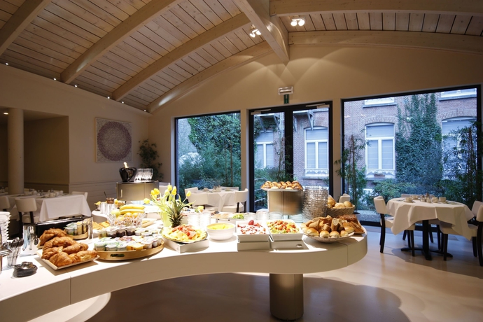 Imagen del bar/restaurante del Hotel Alfa Inn. Foto 7