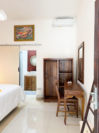 Imagen de la habitación del Hotel Alfa Kuta. Foto 5