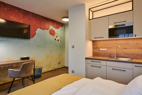 Imagen de la habitación del Hotel Alfr&eacute;d a Herm&iacute;na. Foto 13