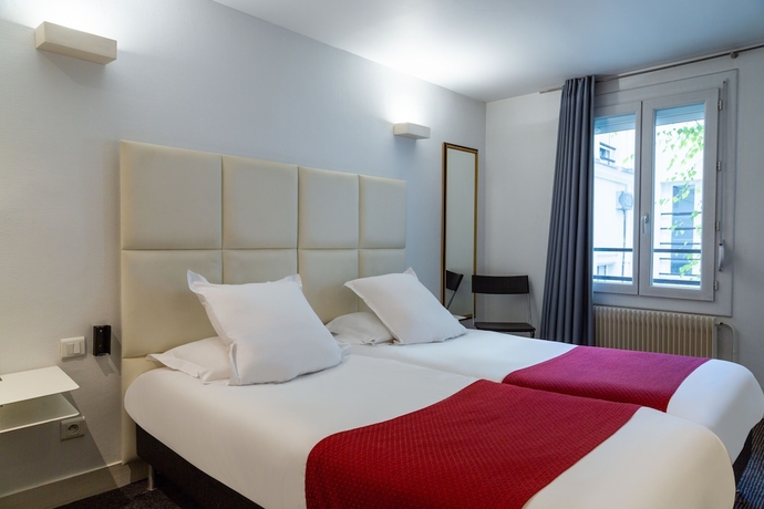 Imagen de la habitación del Hotel Alfred Hotels Paris Lecourbe. Foto 17