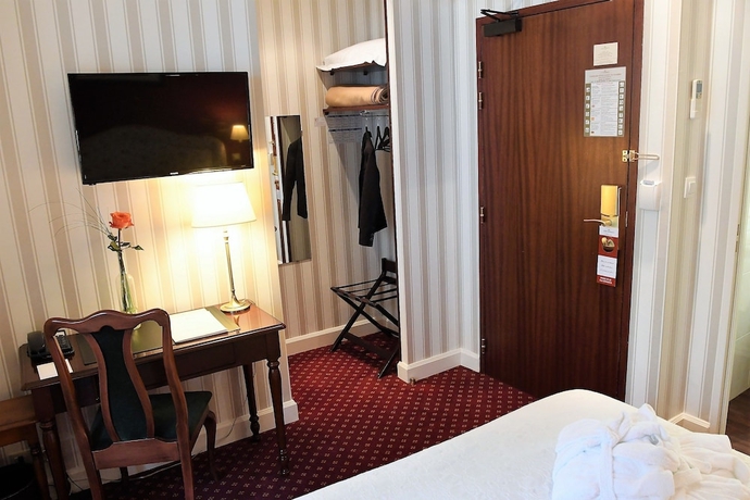 Imagen de la habitación del Hotel Alfred Hotels Port-Vieux. Foto 6