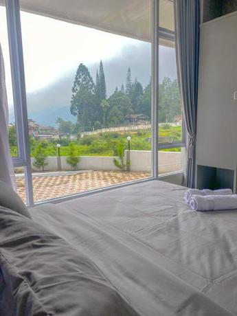Imagen de la habitación del Hotel Algara Puncak. Foto 16