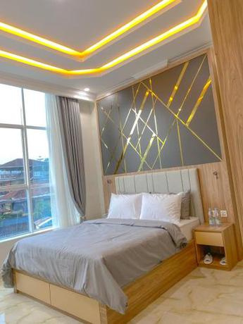 Imagen de la habitación del Hotel Algara Puncak. Foto 17