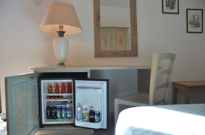 Imagen de la habitación del Hotel Alghero Vacanze. Foto 9