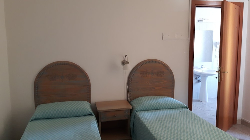 Imagen de la habitación del Hotel Alghero Vacanze. Foto 12