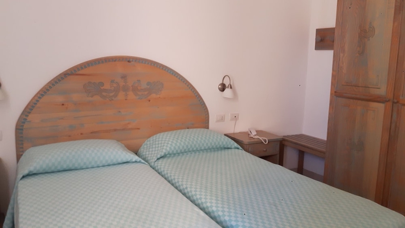 Imagen de la habitación del Hotel Alghero Vacanze. Foto 13
