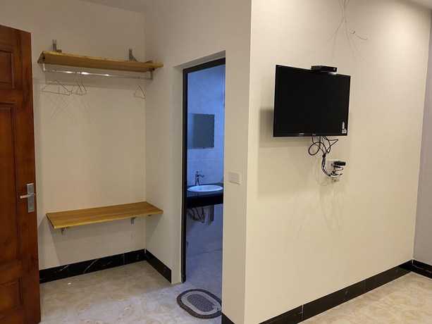 Imagen de la habitación del Hotel Ali Hostel H&agrave; Giang. Foto 11