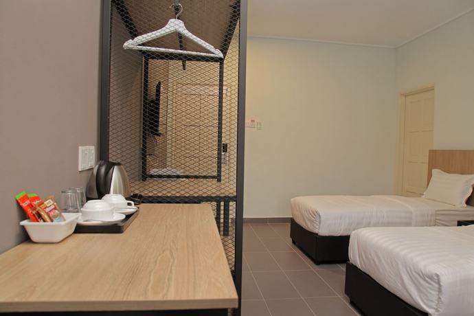 Imagen de la habitación del Hotel Ali Imran. Foto 8