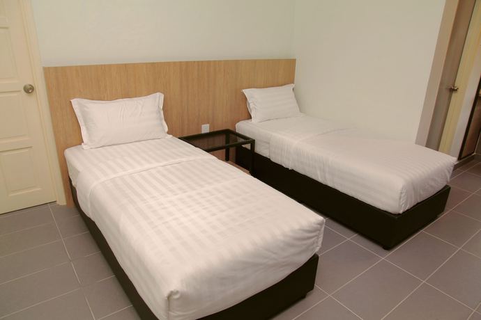 Imagen de la habitación del Hotel Ali Imran. Foto 16