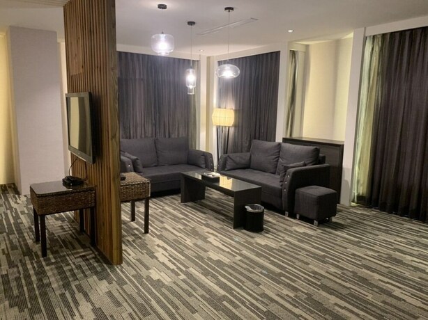 Imagen de la habitación del Hotel Ali Mountain Oriental Pearl International. Foto 13