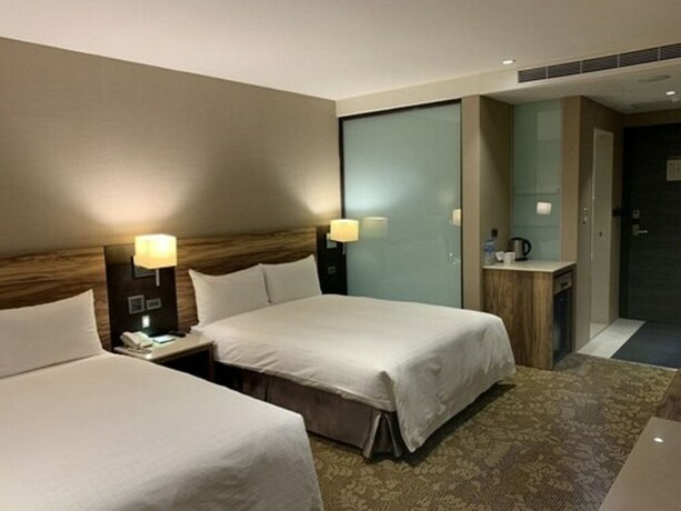 Imagen de la habitación del Hotel Ali Mountain Oriental Pearl International. Foto 17