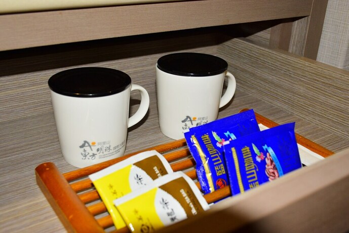 Imagen de la habitación del Hotel Ali Mountain Oriental Pearl International. Foto 18