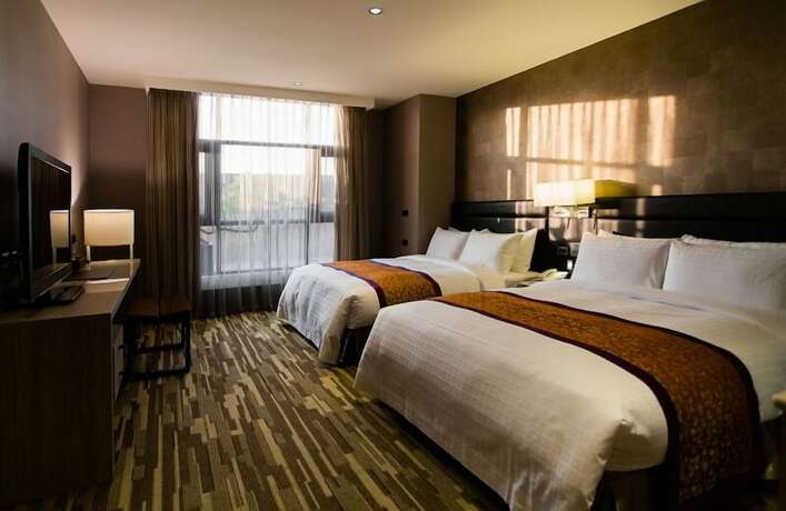 Imagen de la habitación del Hotel Ali Mountain Oriental Pearl International. Foto 27