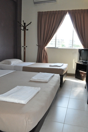 Imagen de la habitación del Hotel Alia Express Ferringhi. Foto 7