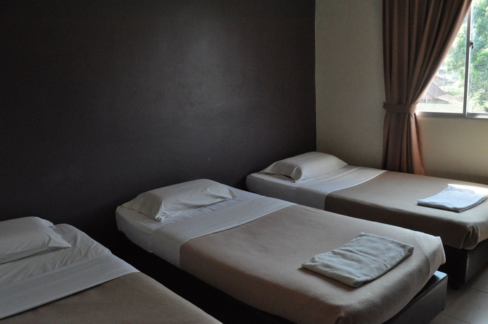 Imagen de la habitación del Hotel Alia Express Ferringhi. Foto 8
