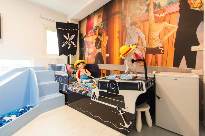 Imagen de la habitación del Hotel Alice Wonderland B&B. Foto 11