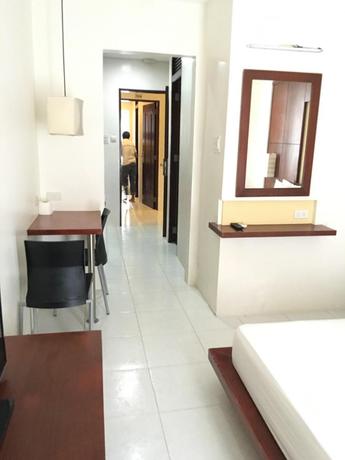 Imagen de la habitación del Hotel Alice in Wonderland Beach Hotel. Foto 4