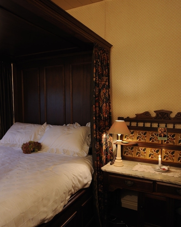 Imagen de la habitación del Hotel Alice's Cottages. Foto 7