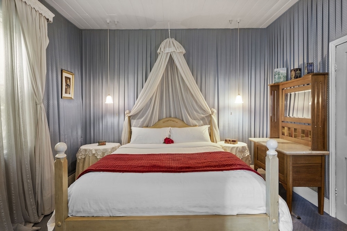 Imagen de la habitación del Hotel Alice's Cottages. Foto 15