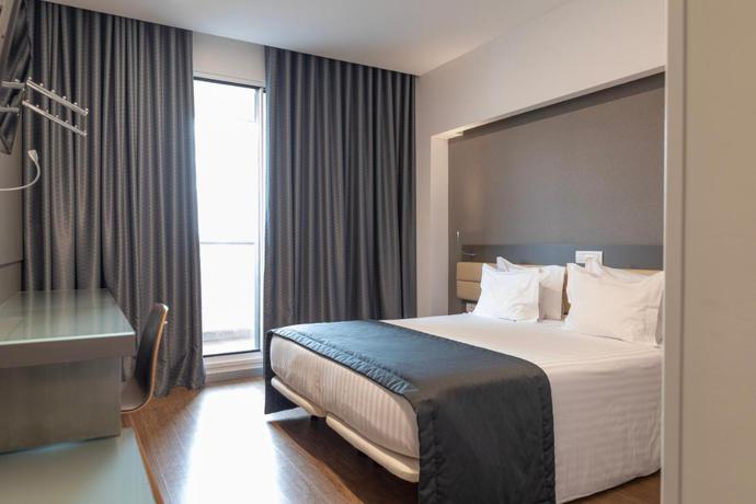 Imagen de la habitación del Hotel Alif Campo Pequeno. Foto 10