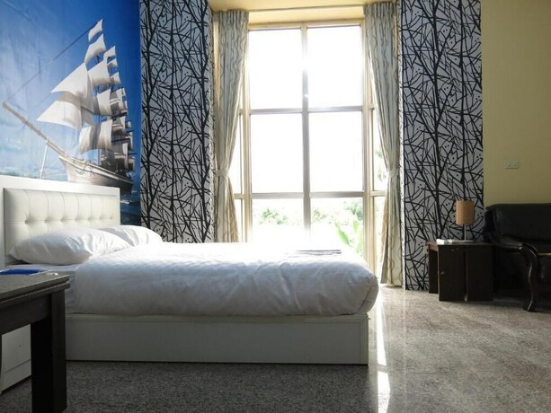 Imagen de la habitación del Hotel Alishan Tsinghua Lions Resort. Foto 9