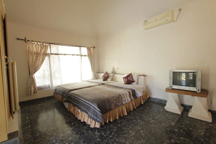 Imagen de la habitación del Hotel Alit Beach Resort and Villas. Foto 3