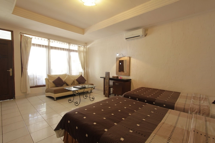 Imagen de la habitación del Hotel Alit Beach Resort and Villas. Foto 5