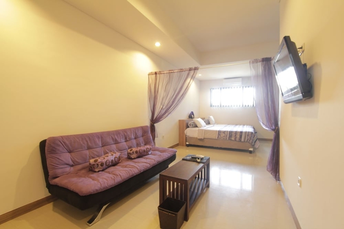 Imagen de la habitación del Hotel Alit Beach Resort and Villas. Foto 6