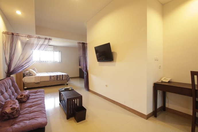 Imagen de la habitación del Hotel Alit Beach Resort and Villas. Foto 7