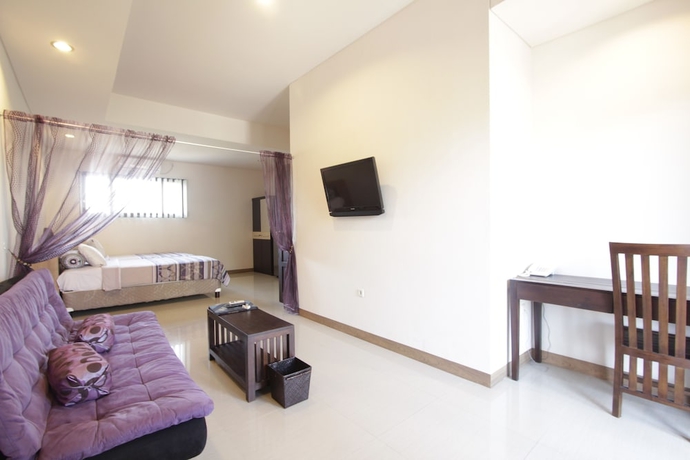Imagen de la habitación del Hotel Alit Beach Resort and Villas. Foto 9