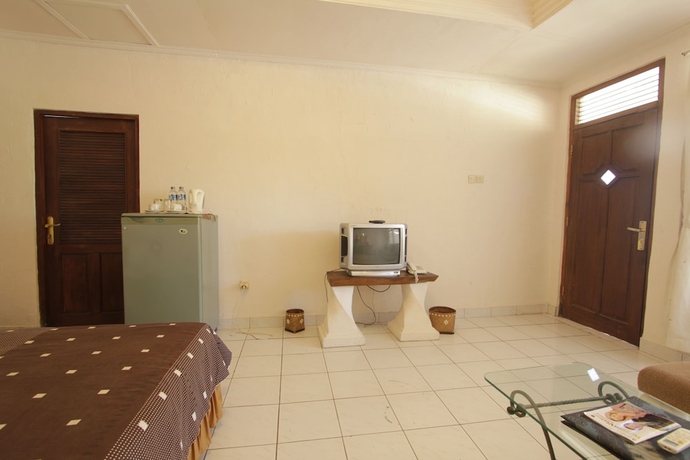 Imagen de la habitación del Hotel Alit Beach Resort and Villas. Foto 13