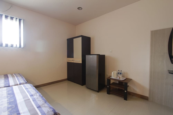 Imagen de la habitación del Hotel Alit Beach Resort and Villas. Foto 14