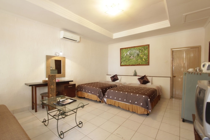 Imagen de la habitación del Hotel Alit Beach Resort and Villas. Foto 15