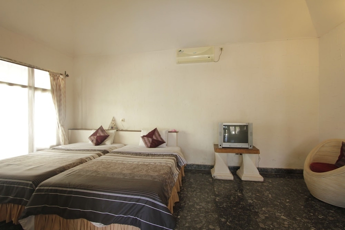 Imagen de la habitación del Hotel Alit Beach Resort and Villas. Foto 16