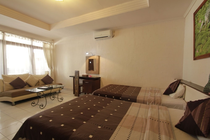 Imagen de la habitación del Hotel Alit Beach Resort and Villas. Foto 17