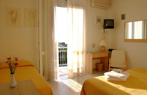 Imagen de la habitación del Hotel Alk, Marina Di Pietrasanta. Foto 20