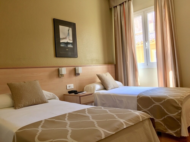 Imagen de la habitación del Hotel Alkázar, Valencia. Foto 11
