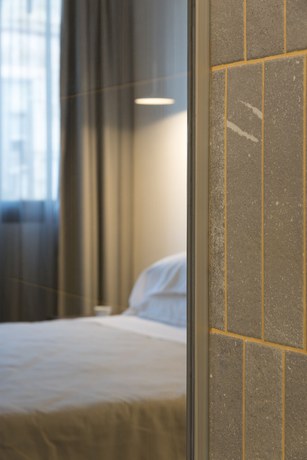 Imagen de la habitación del Hotel Alkamuri Posh and Spa. Foto 10