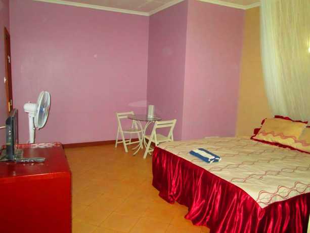 Imagen de la habitación del Hotel All African. Foto 10