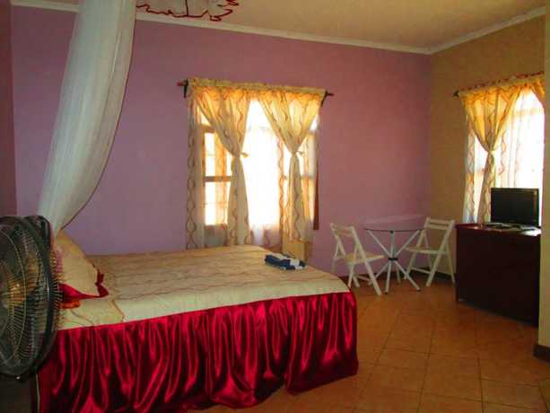 Imagen de la habitación del Hotel All African. Foto 12