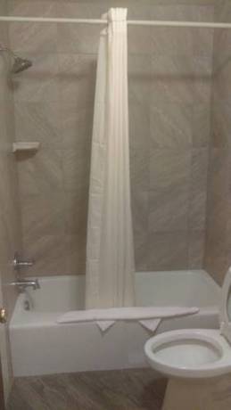 Imagen de la habitación del Hotel All American Inn And Suites. Foto 2