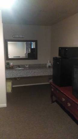 Imagen de la habitación del Hotel All American Inn And Suites. Foto 4