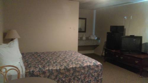 Imagen de la habitación del Hotel All American Inn And Suites. Foto 5