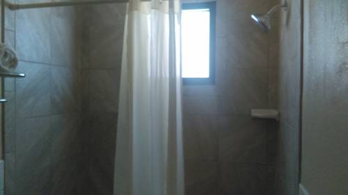 Imagen de la habitación del Hotel All American Inn And Suites. Foto 8