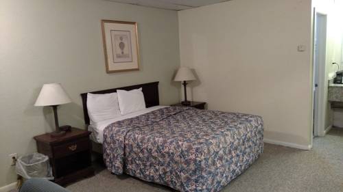 Imagen de la habitación del Hotel All American Inn And Suites. Foto 11