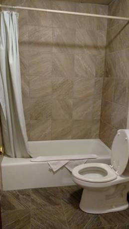 Imagen de la habitación del Hotel All American Inn And Suites. Foto 15