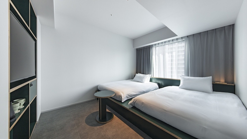 Imagen de la habitación del Hotel All Day Place Shibuya. Foto 2