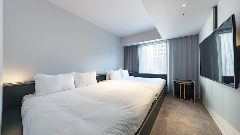 Imagen de la habitación del Hotel All Day Place Shibuya. Foto 6